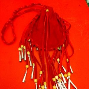 Hand made deer hide jingle purse